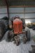 Buch D30 tractor. Unknown vintage. 2 engine included. Hole in block on the engine sitting on the tractor.