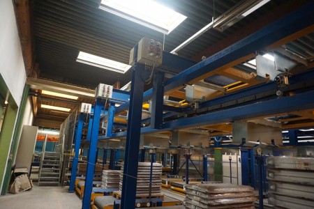 Complete construction structure over lifting tables and transport including conveyor track Everything is bolted together.