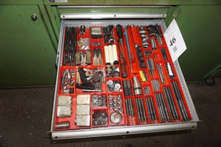 Various clamping blocks tool holders, nuts, etc.