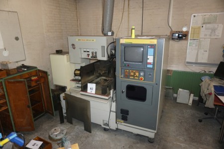 Matra Fanuc Tape Cut-wo Thread Grinders With accessories in cabinets.