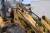 Caterpillar 906 Gummihjuls læsser skovl med hydraulisk  overfaldsgrab alm skovl og pallegafler, Hænger i Hurtigskifte, i venstre side. Ellers fuld funktionsdygtig. Fra konkursbo.