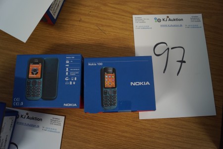 2 NOKIA 100 phones, unused