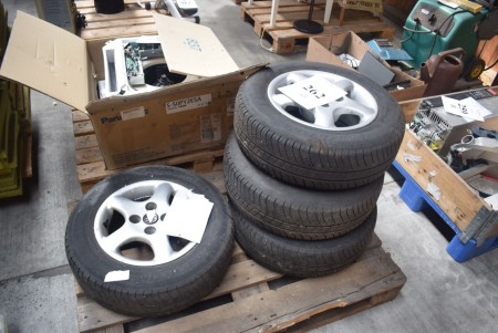 4 alloy wheels with tires. 185/70 R14 Fits peugeot.