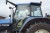 New Holland TM135, regnr: dj19181, with front lift brand: zuidberg, hours: 7791