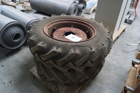 2 pcs. tractor tires with rims.