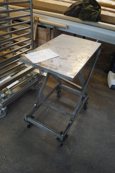 Rolling table with adjustable height.