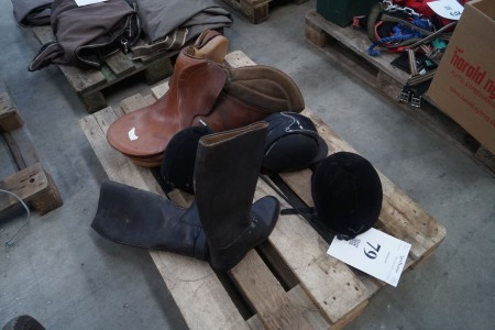 Various horse equipment + saddle.