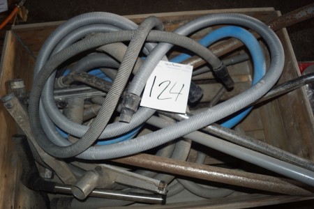 Pallet with vacuum hoses.