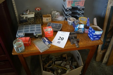 Contents on table and box of various screws and nails etc.