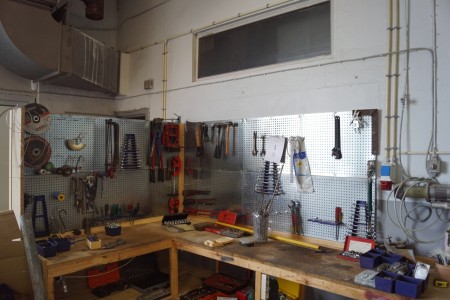 Lot Tools on shelf and table.