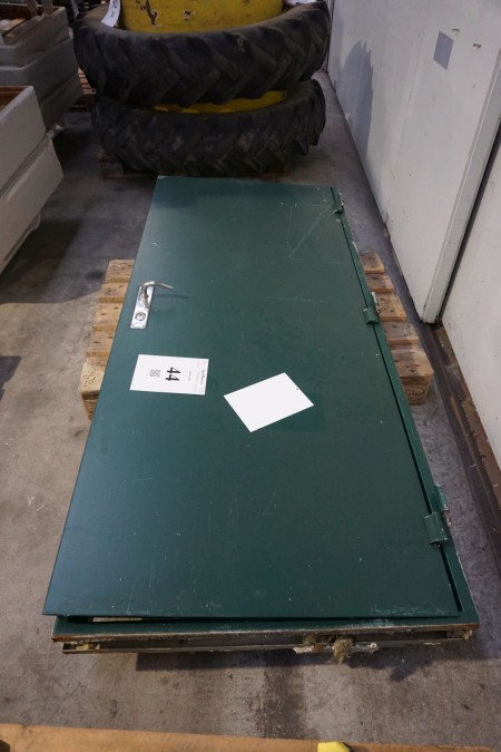 Iron door. W: 88cm, h: 205.5cm.