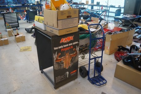 Shopping cart with miscellaneous, baggage bag, punctured plus rack on wheels, with contents