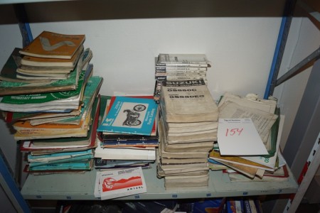 Various instruction books on shelf