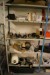 4 compartment steel shelves with various spare parts