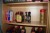2 shelves with different oils and manuals