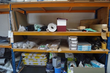 Contents on pallet rack, including residue of laminate, substrate, insulation boards, glue, putty, door etc. Everything has to be removed.