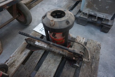 Hydraulic hose press with pump.