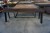 1 piece wooden table with iron stand, l: 104cm, b: 80cm, h: 48cm + wooden bench, l: 140cm, h: 48cm, d: 30cm.
