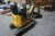 New Holland / Kobelco E9SR Mini digger year. 2005 2222 hours, with 3 buckets 20 - 40 and 80 cm. Well maintained, starts and runs, with new belts, everything works.