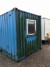 20 foot container. Converted to a shed with toilet, and dining room.