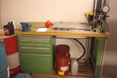 Workbench with drawer constructed with hydraulic pressure test station with various hydraulic tools, etc.
