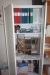 Steel cabinet with key + 3 shelves + board + drawer. All without content.