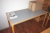 Electric sit / stand desk + drawer + 2 chairs + 2 shelves + cabinet + roll front cabinet + docking station + whiteboard.
