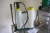 (3) stepladders, aluminum +  knapsack sprayer + hose reel with hose