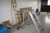 (3) aluminum stepladders + wooden ladders