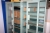 2 steel cabinets with sliding glass doors on the warehouse ceiling