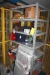 Storage room with aircraft seats, grill and steel shelving