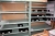 Storage rooms with grille and steel shelving