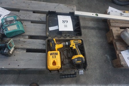 Dewalt drill with 2 batteries and charger, tested and ok.