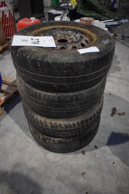 4 steel rims with tires. 195 / 65R14. From the bankruptcy estate of Egholm Painting Company