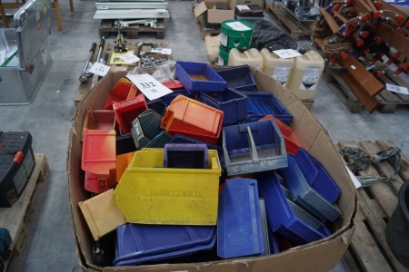 Lot of plastic boxes in different sizes.