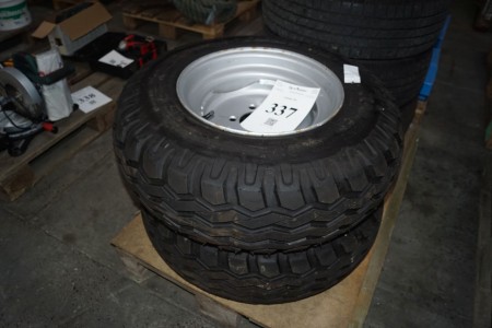 2 pc machine tires with rims. Brand: FARM KING. 10.0 / 75 to 15.3.