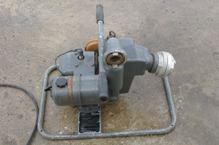 Motorized petrol water pump 2 inches, with hoses.
