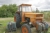 Fiat 1000 tractor with front weights, hours: 9479. Starts and runs well, battery defect. The left door is missing
