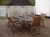 Havemøbler, træ. Stort bord m/hul til parasol. Kan nemt sidde 10 personer ved bordet. 6 stk. stole med ligge-funktion. Serveringsvogn medfølger