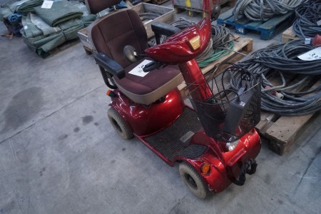 4-wheel electric scooter, with charger. However, need new batteries.