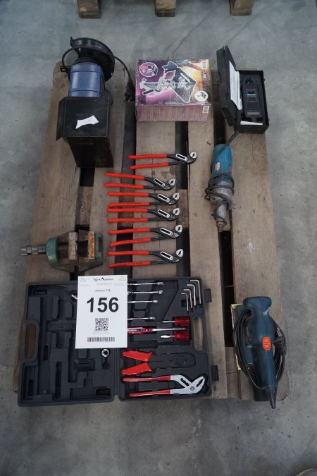 Various power tools, pliers, machine screws, etc.