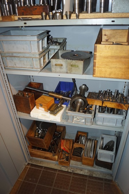 3 shelves with various tools for cutters + cutting discs, bolts etc.