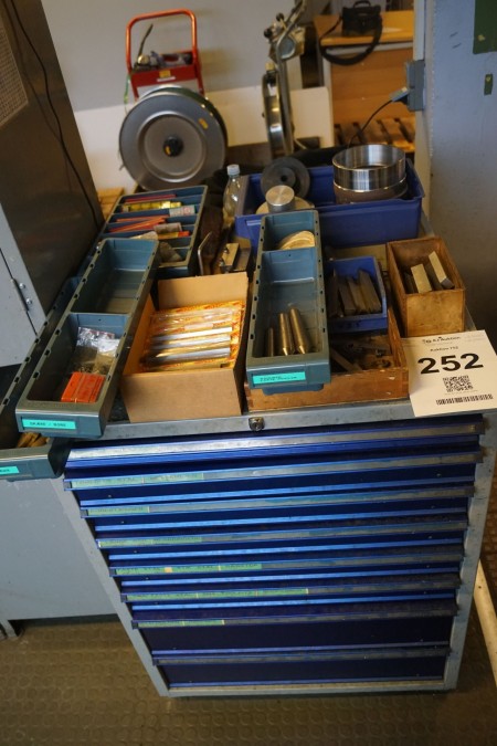 Tool cabinet with contents of various lathe tools.