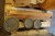 Various boxes both in wood and alu + hardened glass lot + work lamps + lot ignition cables