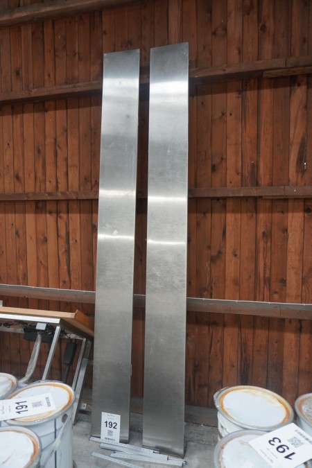 2 stainless steel plates with rails.