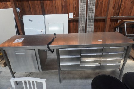 Stainless steel raised kitchen countertop.