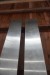 2 stainless steel plates with rails.