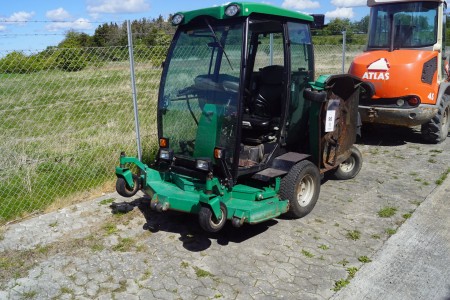 Utility carrier with mower. Model: Ransomes.