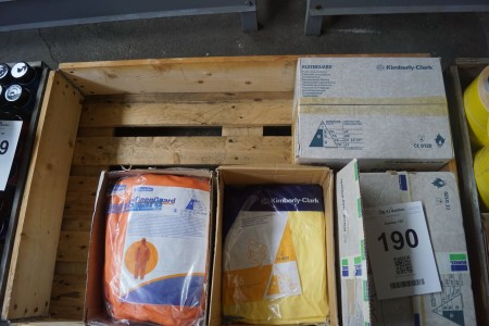 4 boxes with safety suits