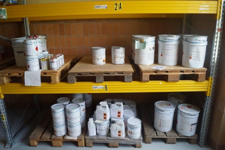 Large lot of paint on and under the rack